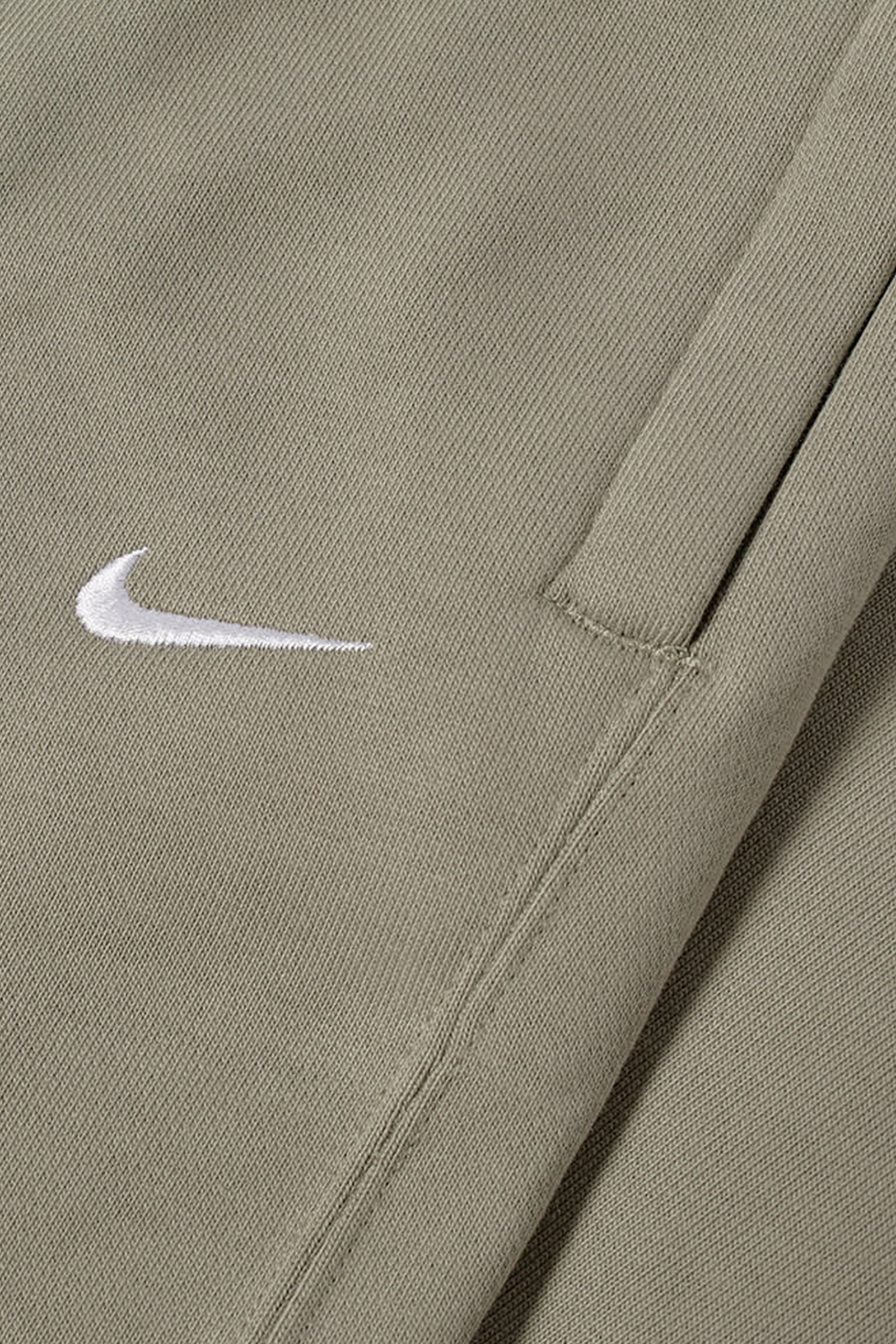 Nike W NRG Solo Swsh FLC Pant Light army/white (320) | WoodWood.com